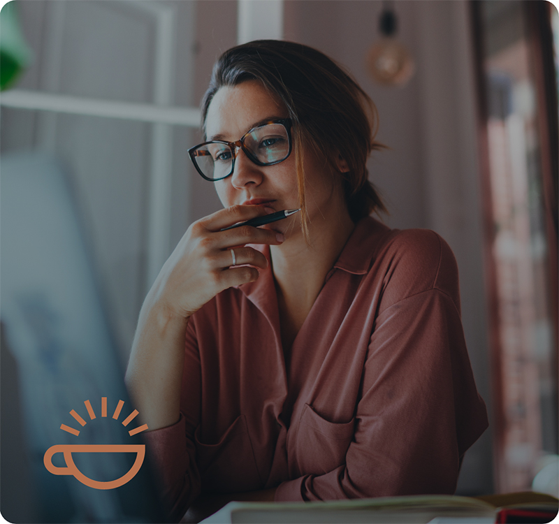 Person studying resources from Life Over Coffee